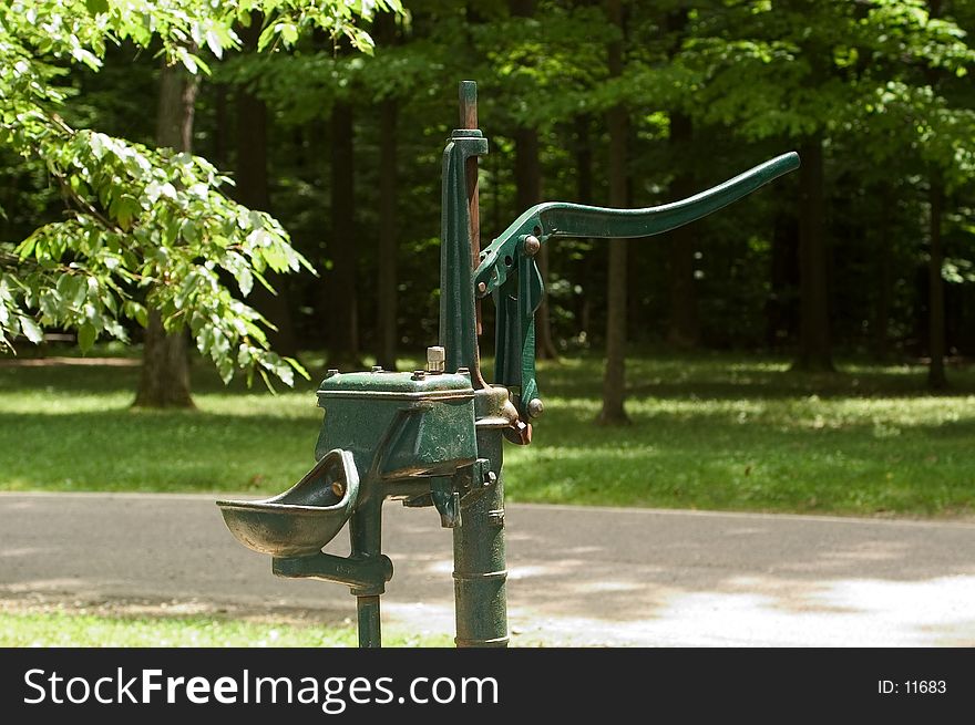 Old fashioned pump style water pump in a park in Northern Ohio. Old fashioned pump style water pump in a park in Northern Ohio.