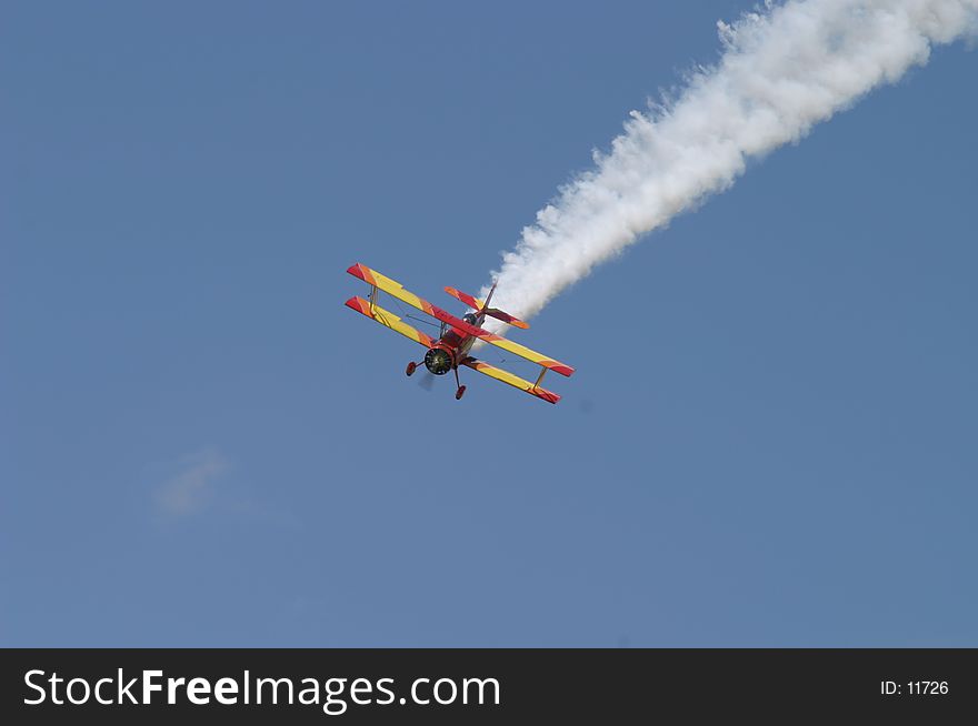 Aerial acrobatics at a summer air show. Aerial acrobatics at a summer air show