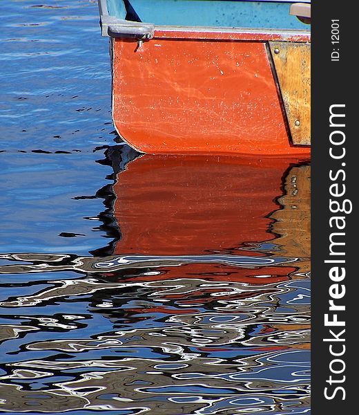 Reflection of back of rowboat. Reflection of back of rowboat.