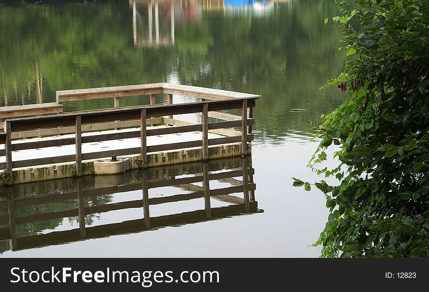 A fishing dock extends into a lake in northern Ohio, letting people get closer to the fish.