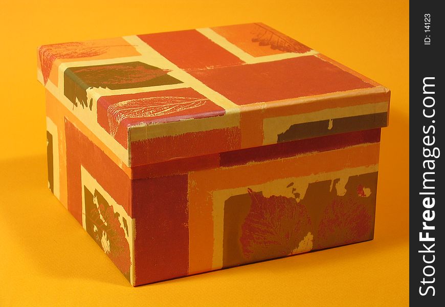 Top view of an orange colored box. Top view of an orange colored box.