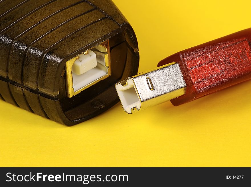 Photo of USB Cable and Device. Photo of USB Cable and Device