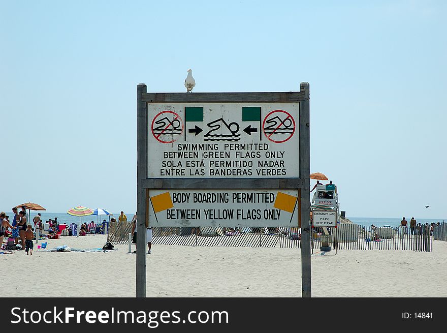 Photo of a Sign on the Beach. Photo of a Sign on the Beach