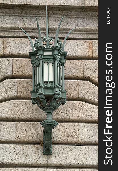 Close up of ornate lighting fixture on the side of an historic building in Cleveland, Ohio