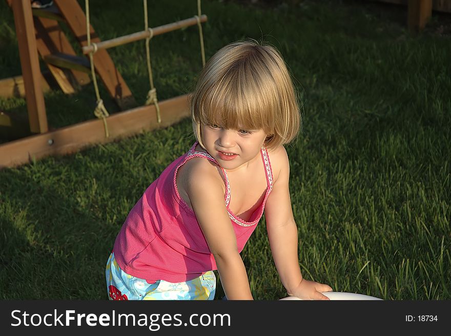 Photo of Young Girl Outdoors at Sunset. Photo of Young Girl Outdoors at Sunset.