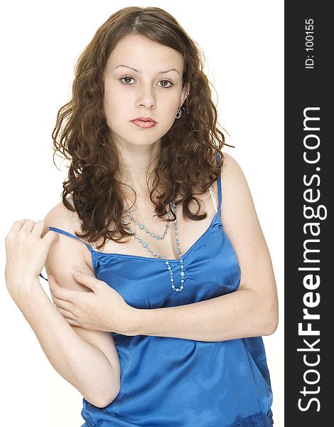 A beautiful young woman in a striking blue top. A beautiful young woman in a striking blue top