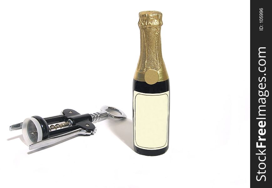 Bottle with blank label and corkscrew. Bottle with blank label and corkscrew
