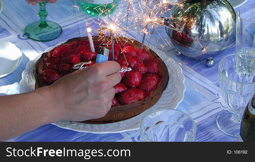 Birthday cake with candles glowing. Birthday cake with candles glowing.