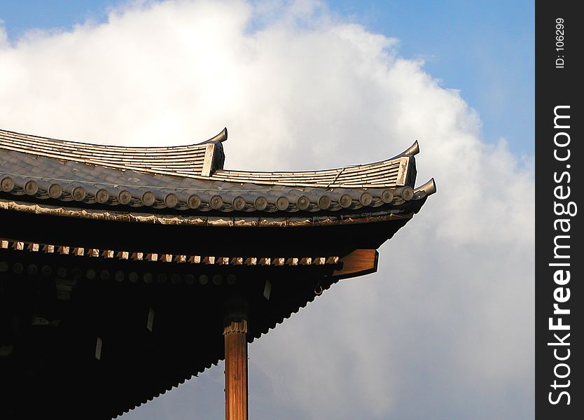 Temple Roof And Cloudy Sky