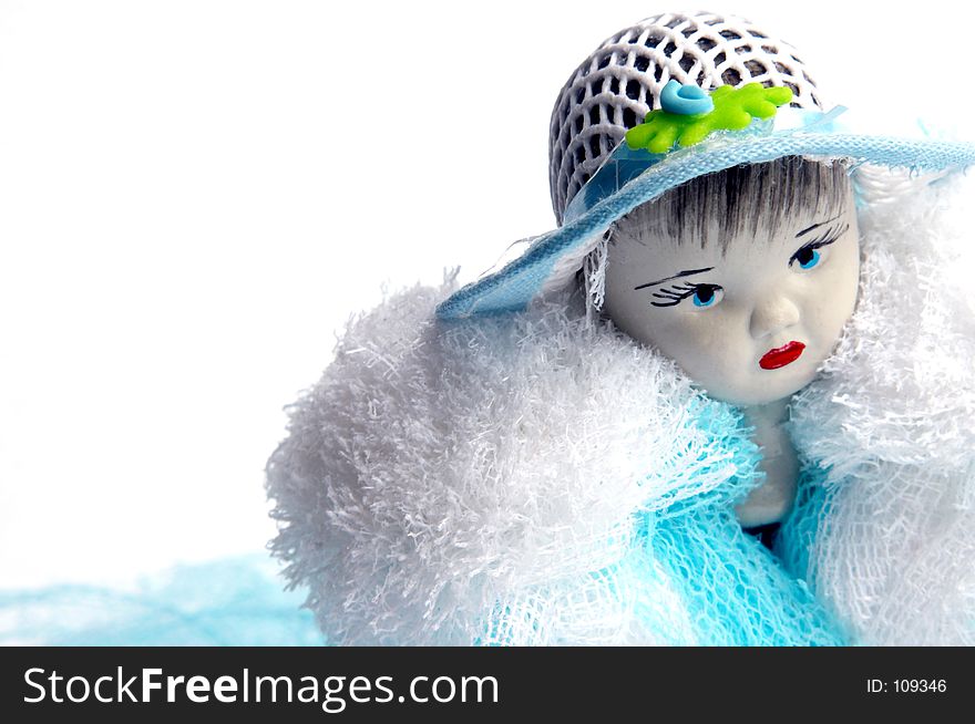 Doll face over white background