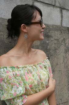 Side Profile Of A Woman Wearing Big Shades Stock Photography