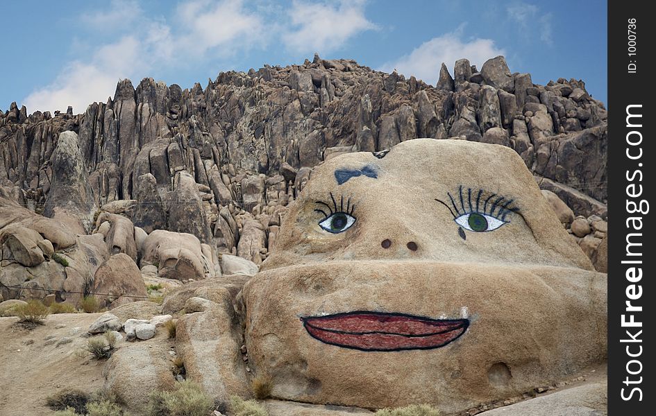 Rock mountain with smiley face rock