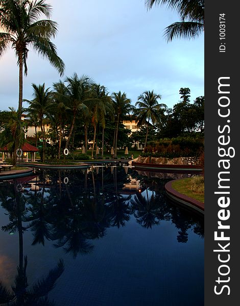 Evening at a city resort poolside