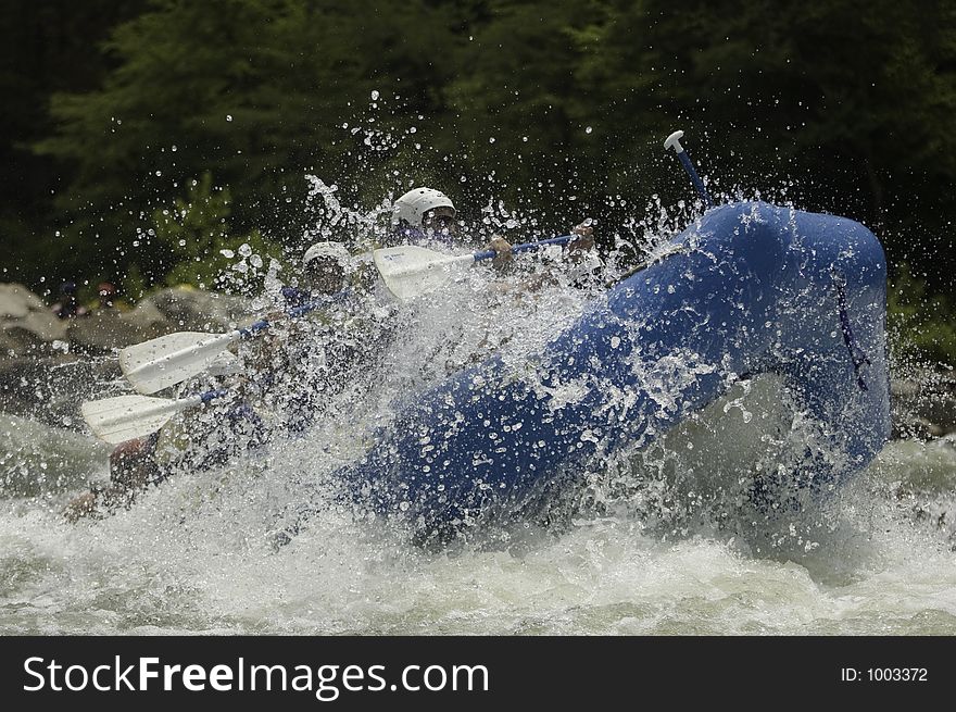 Whitewater Rafters in Rapids