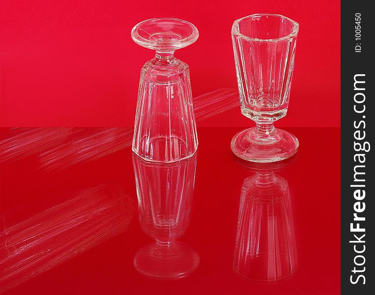 Liqueur glass on red background