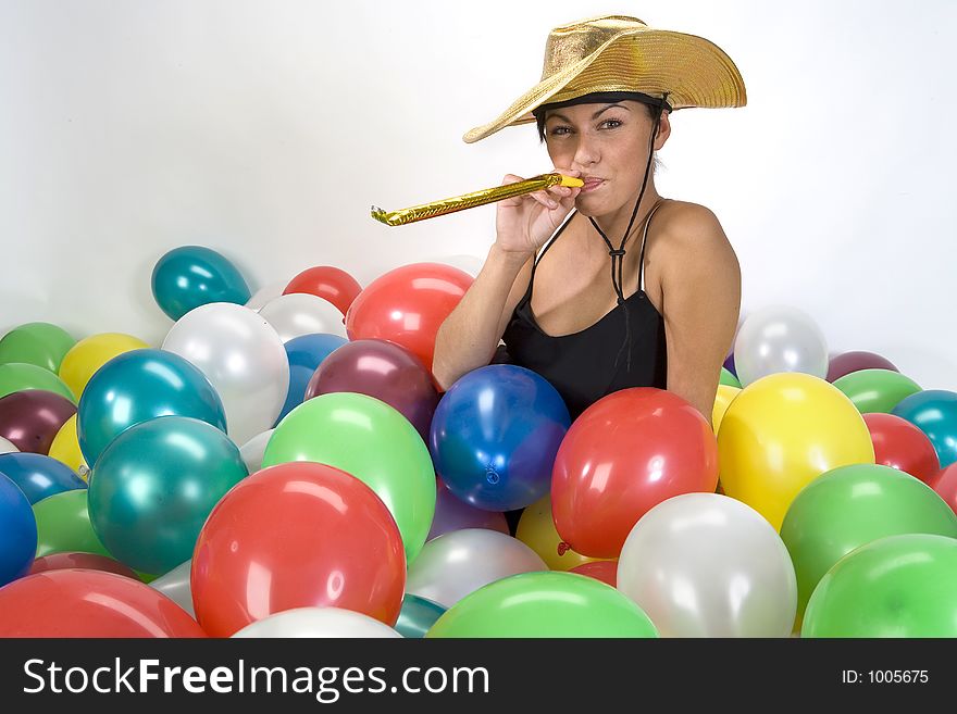 Smiled girl in colorful baloons