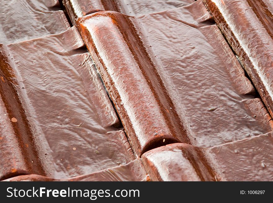 Roofing tiles after a rain storm. Roofing tiles after a rain storm.