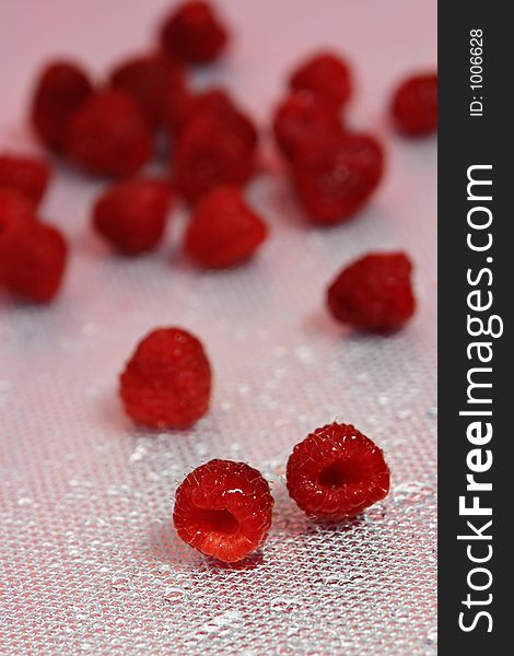 Raspberries on white background