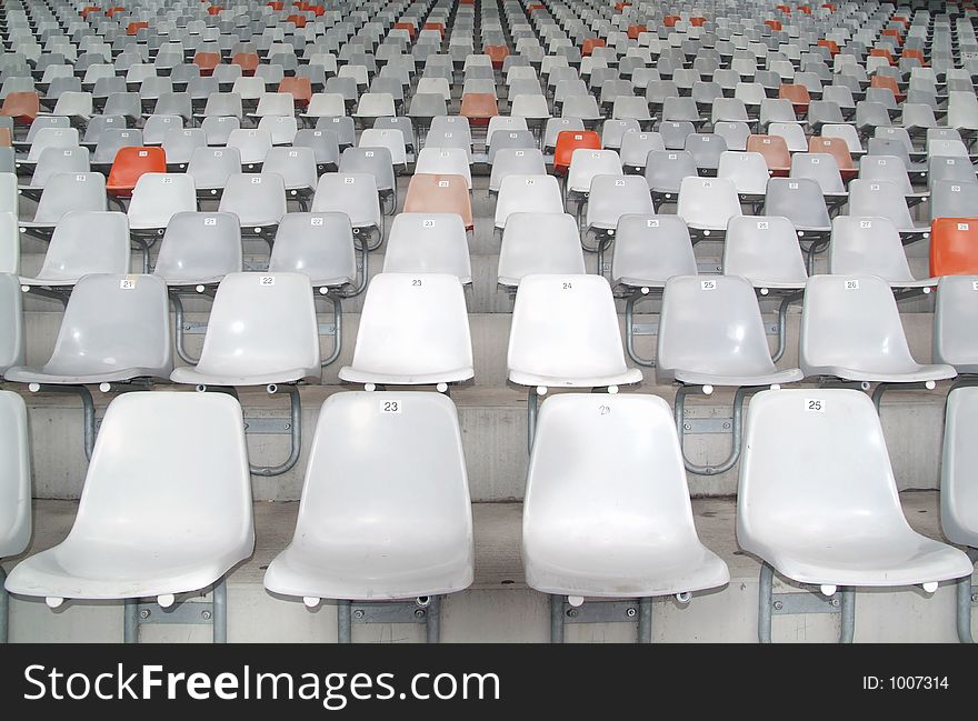 Many seats in an empty stadium. Many seats in an empty stadium