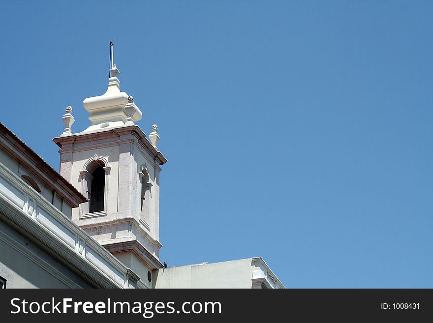 Lisbon Church Tower over a blue sky