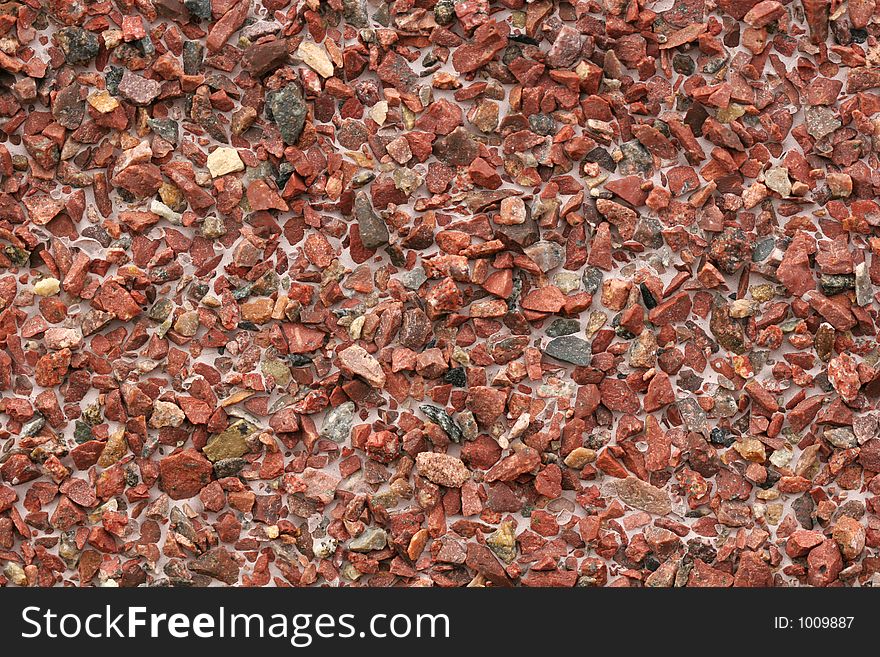 A red rock texture on a wall