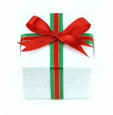 White Gift Box With Red And Green Ribbon Royalty Free Stock Photography White Gift Box With Red And Green Ribbon Royalty Free Stock Photography