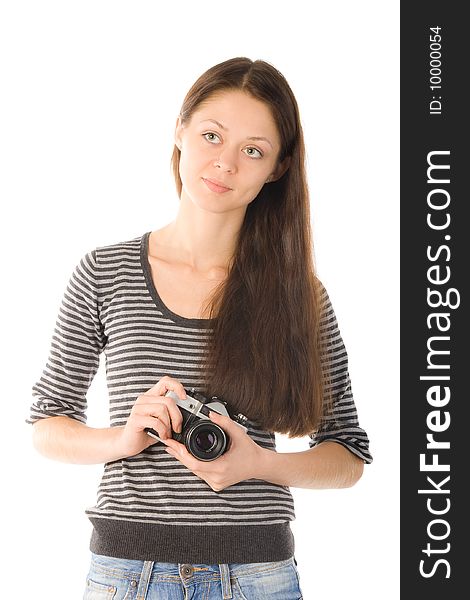 Smiling girl with old-fashioned camera in her hands isolated on white. Smiling girl with old-fashioned camera in her hands isolated on white