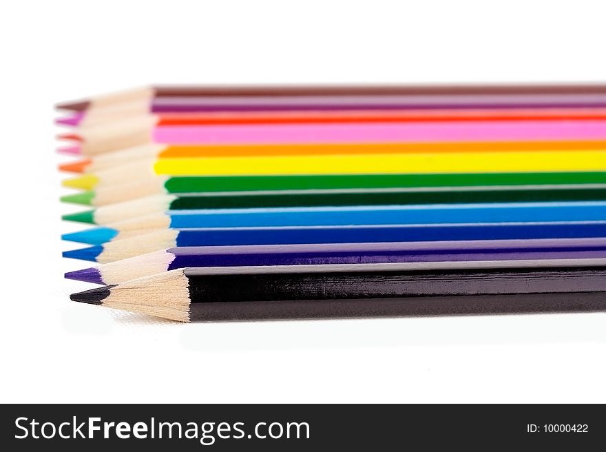 Closed-up Aligned color pencils isolated on white background. Closed-up Aligned color pencils isolated on white background
