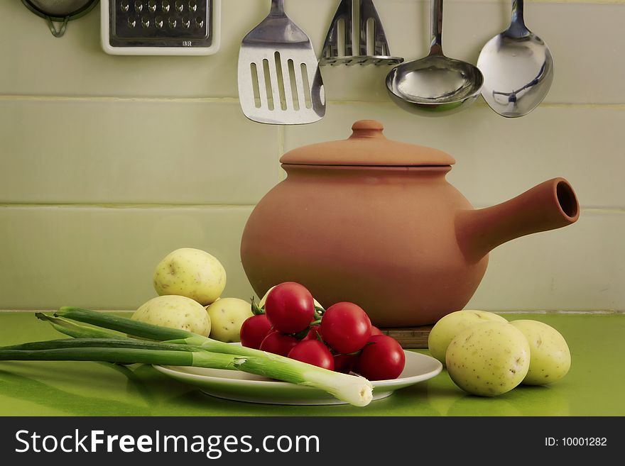 Vegetables and kitchen utensils composition. Vegetables and kitchen utensils composition