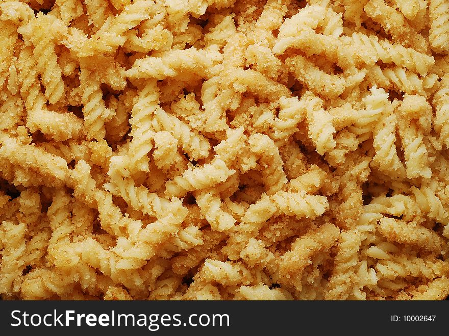 Cooked pasta with walnuts background. Cooked pasta with walnuts background