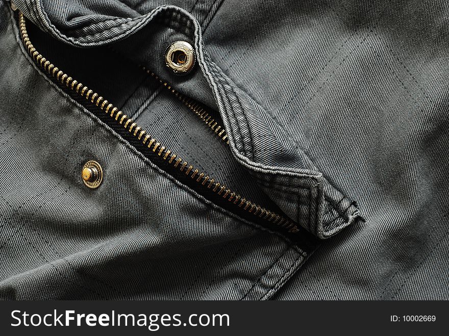 Pocket with zipper on some gray pants