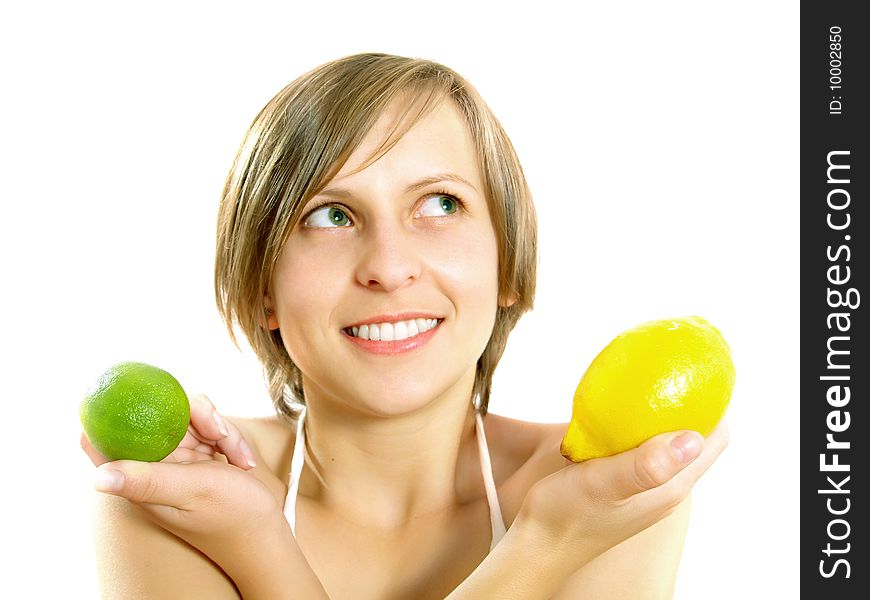 Smiling attractive girl with citrus fruits
