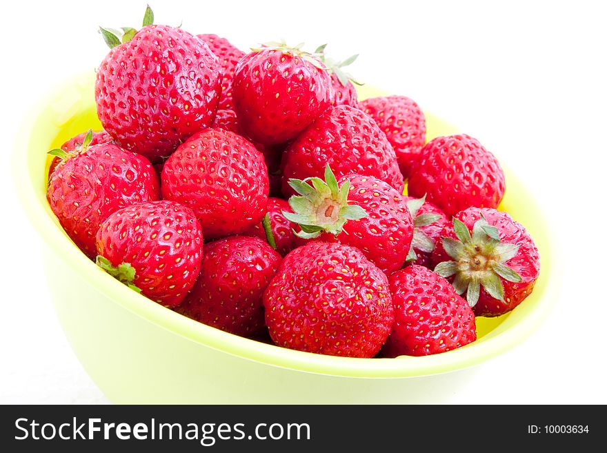 Strawberry in the bowl isolated