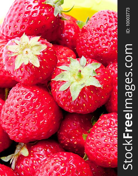 Strawberry in the bowl isolated