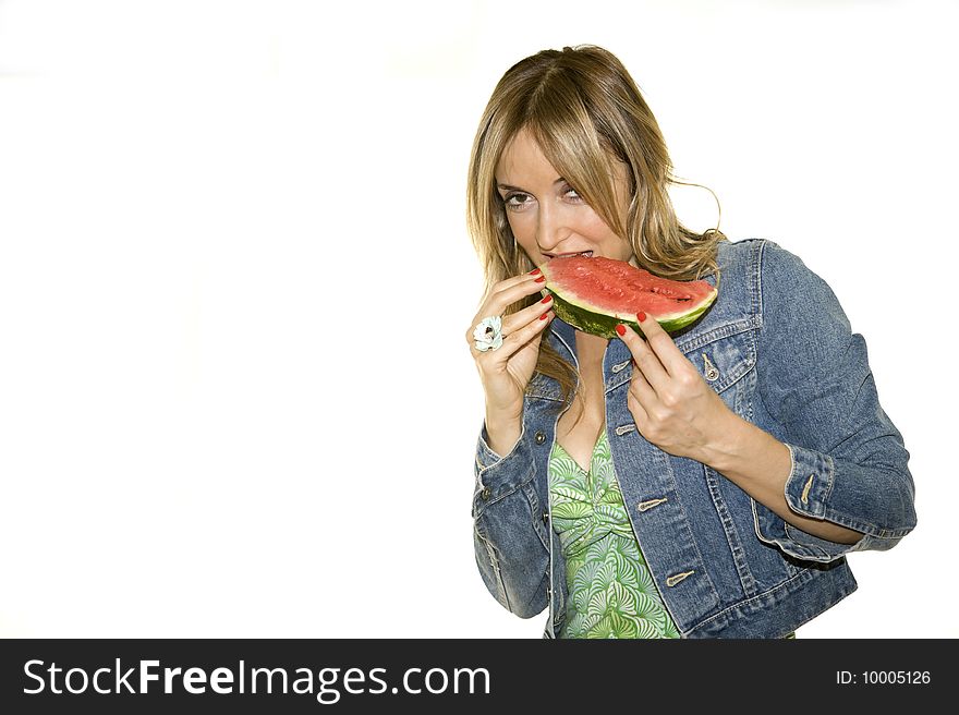 A young woman about to enjoy the perfect slice of watermelon. Isolated on white