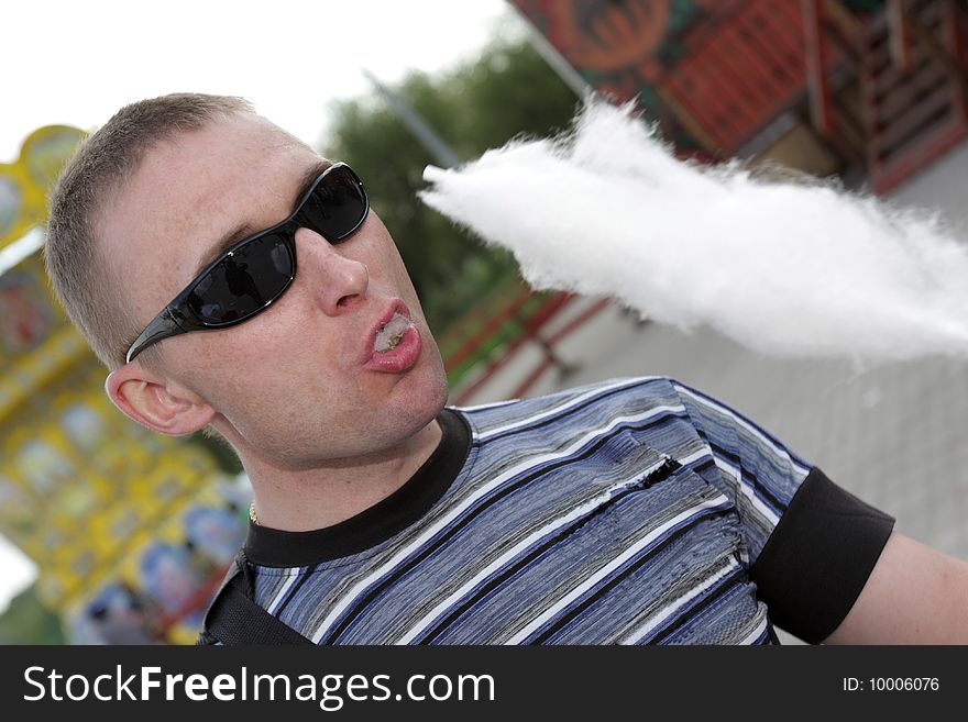 The hungry man with candy floss, outdoor