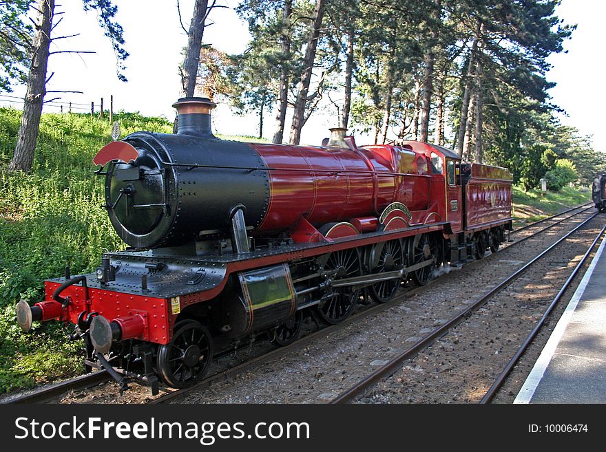 Steam train standing at platform. Steam train standing at platform