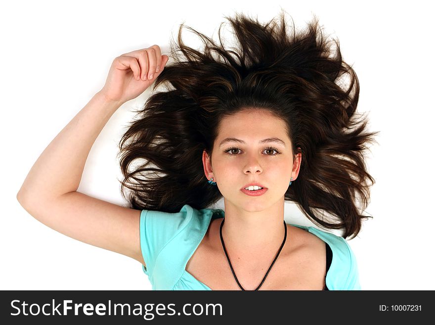 Girl with spread hair on white background. Girl with spread hair on white background