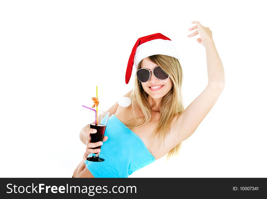 Santa girl with glass of juice over white