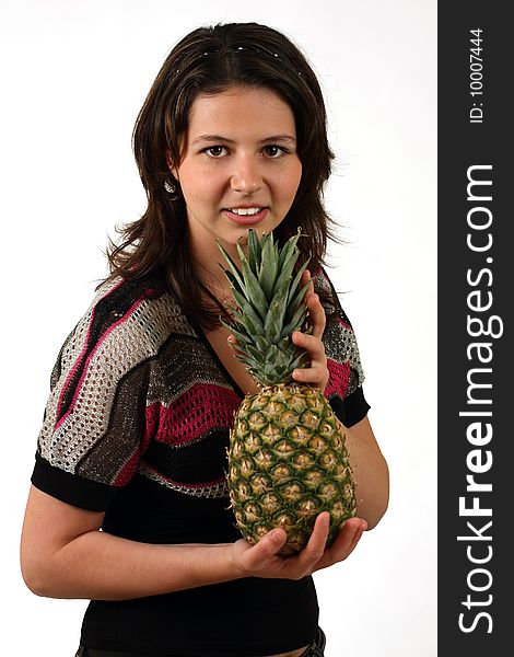 Young girl with pineapple on white background. Young girl with pineapple on white background
