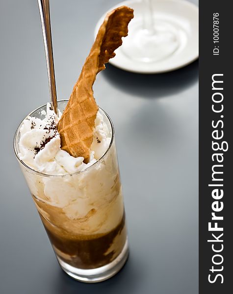 Close up on a glass full of icecream and whipped cream. Freshness, relaxing, summer concept. Jpeg file with clipping path included. Close up on a glass full of icecream and whipped cream. Freshness, relaxing, summer concept. Jpeg file with clipping path included.