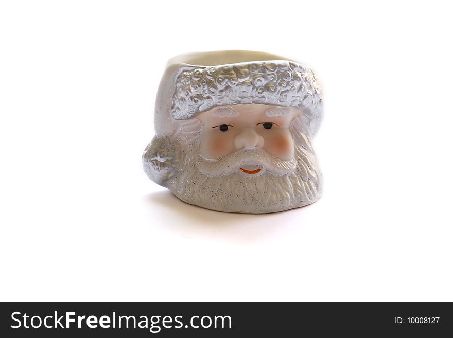 an ornamental candle of santa claus isolated on a white background. an ornamental candle of santa claus isolated on a white background