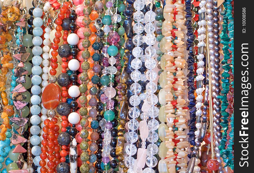 Necklaces of all colors and shapes closeup