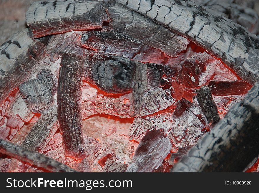 Glowing coals in a barbecue grill. Glowing coals in a barbecue grill