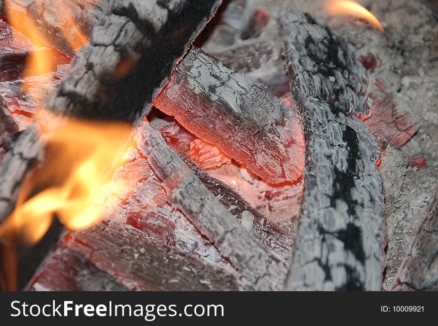 Glowing coals in a barbecue grill. Glowing coals in a barbecue grill