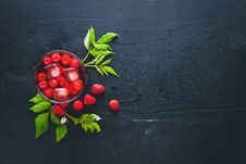 Cocktail Of Fresh Raspberries With Ice, On A Wooden Background Royalty Free Stock Images