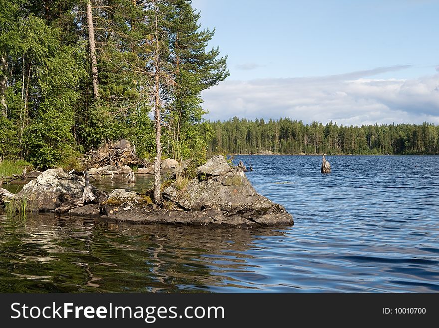 Landscape of Karelian lake and sky with clouds. Landscape of Karelian lake and sky with clouds