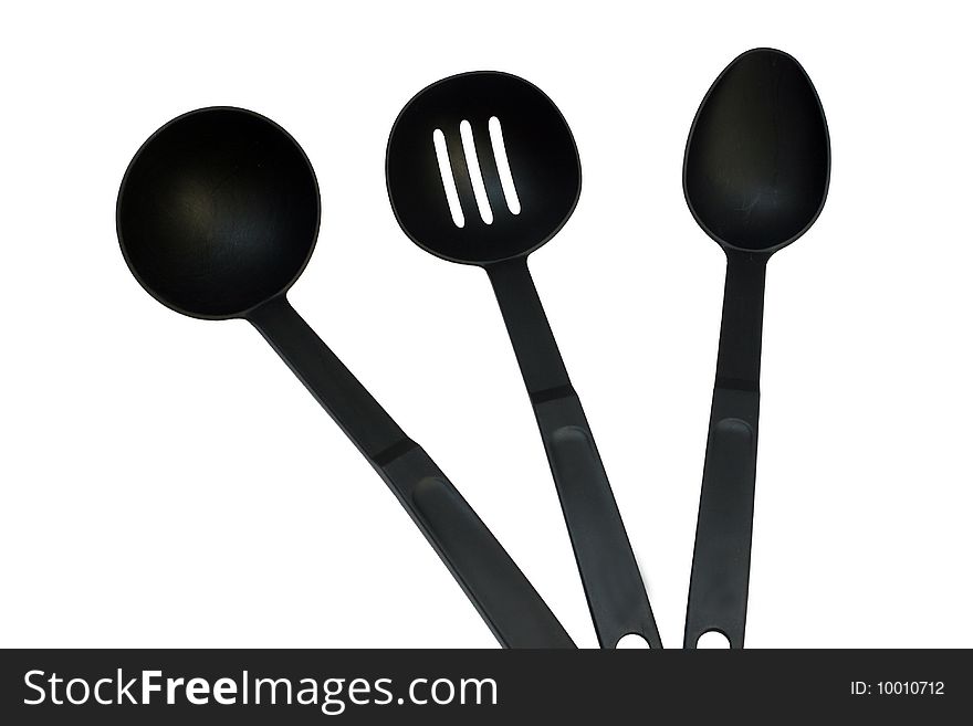 3 different black kitchen ladles on a white background. 3 different black kitchen ladles on a white background
