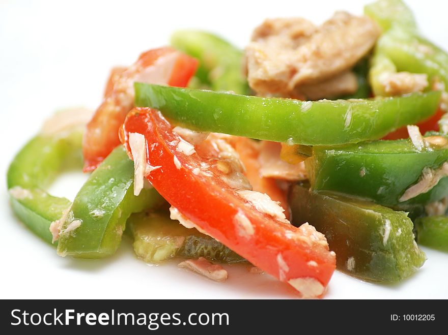 Tasty tuna salad isolated on white background