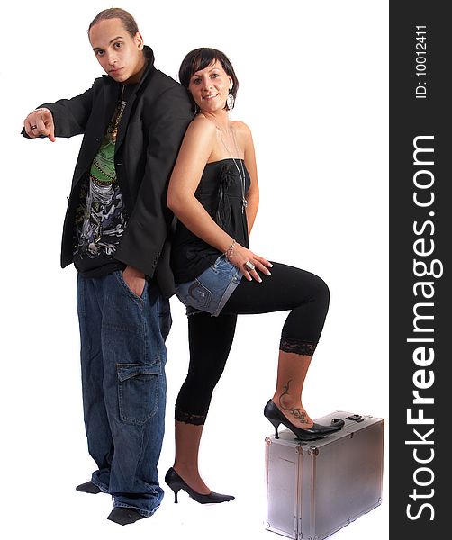 Young stylish couple isolated over white. She is standing on dj case. Young stylish couple isolated over white. She is standing on dj case.